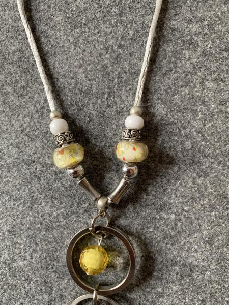 Kette  Gelbtöne, (3x Ringe,Kugeln, Stern)