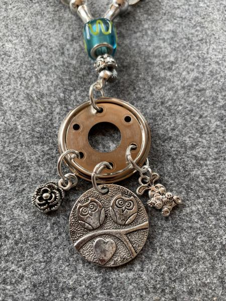 Kette silber-grün ( Eulen, Häschen, Blume)